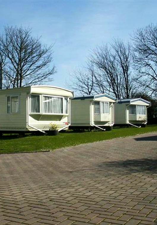 Caravans beside the driveway